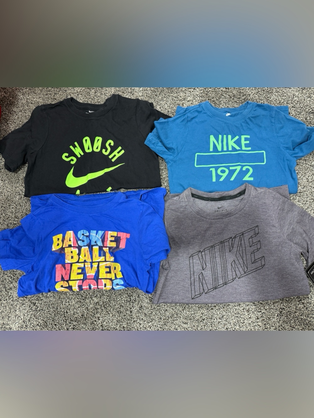 Nike Kids Short Sleeve Graphic Tees. Size medium. Set of 4
